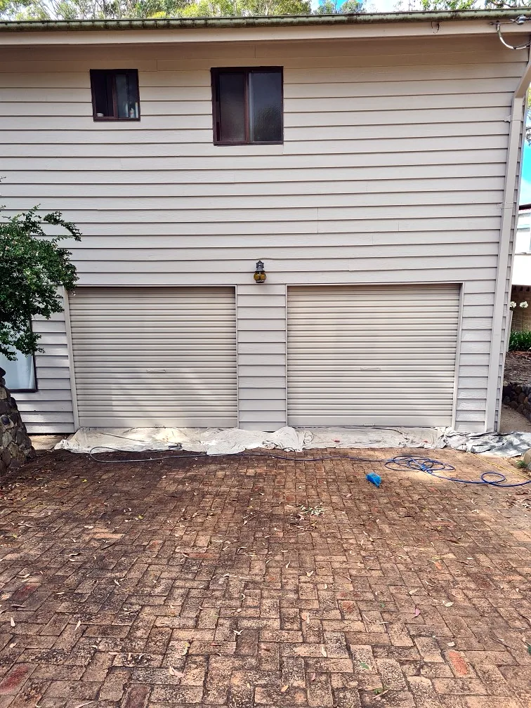 Exterior repaint of a house and double garage
