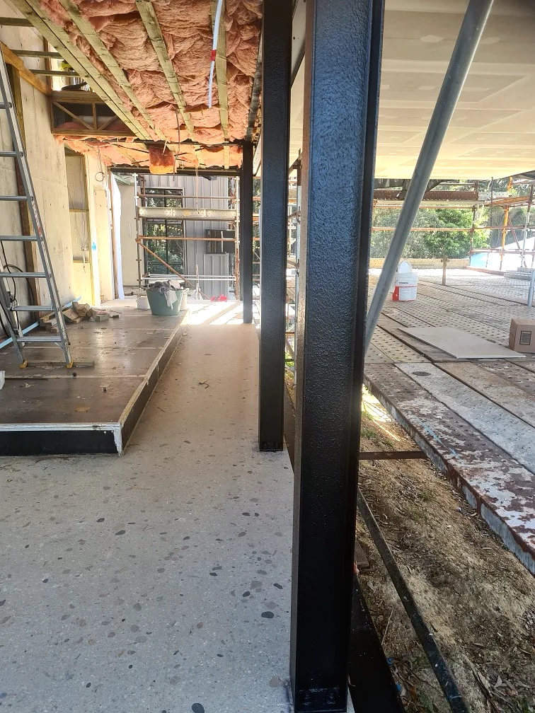 Structural steel painted with protective coating